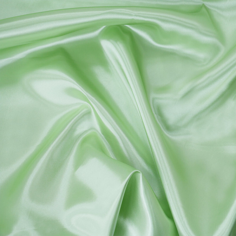Satin ljusgrön polyester festtyg 120 g, se vårt sortiment av heminredning, garn & tyger. Alltid till bra priser.