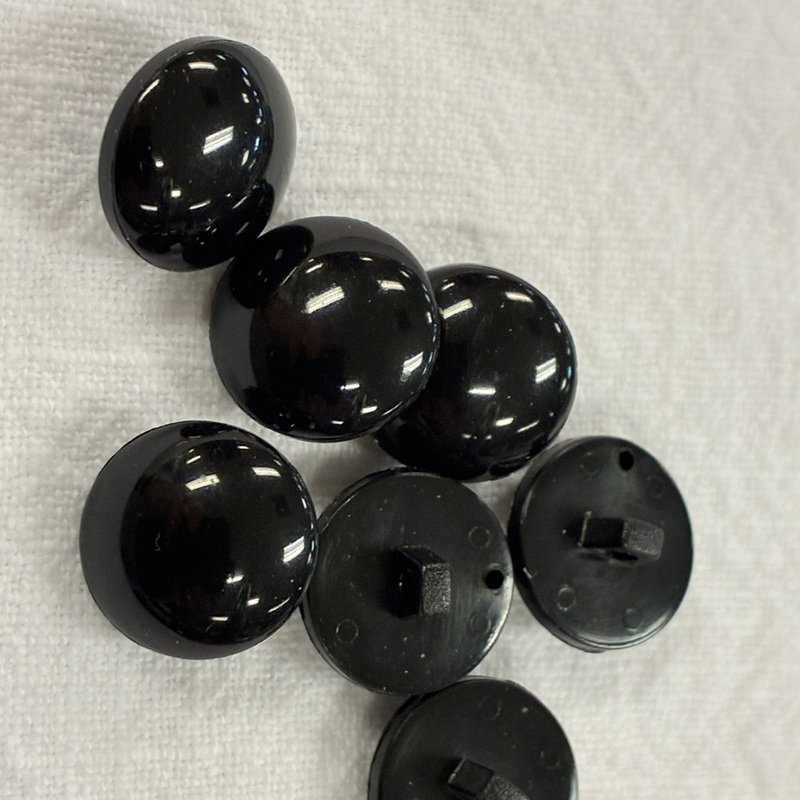 knapp baksydd, svart, ca15mm, se vårt sortiment av heminredning, garn & tyger. Alltid till bra priser.