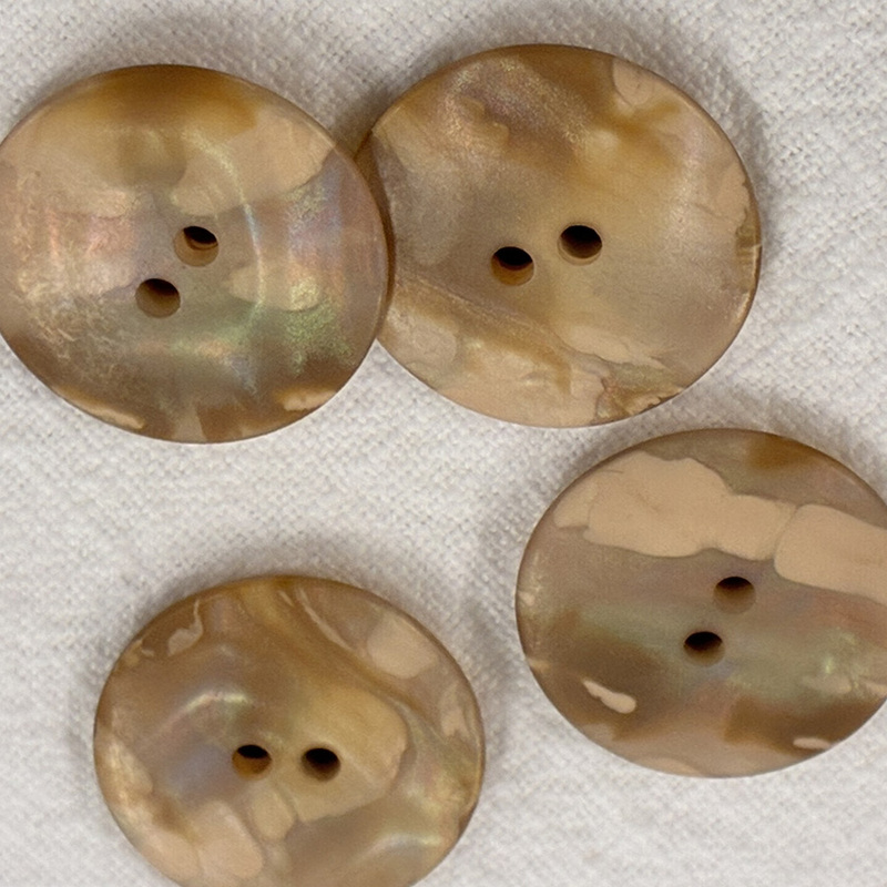 knapp melerad m 2 hål 23mm, se vårt sortiment av heminredning, garn & tyger. Alltid till bra priser.