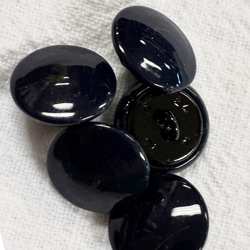knapp baksydd, marinblå 15mm, se vårt sortiment av heminredning, garn & tyger. Alltid till bra priser.
