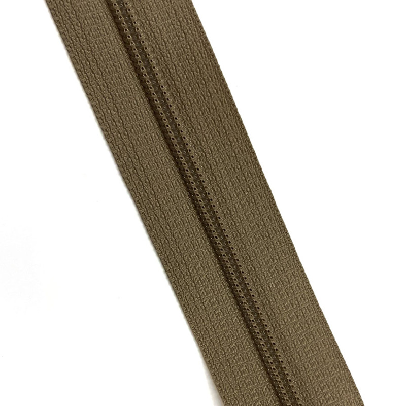 Blixtlås 35 cm Y100 4mm Mörkbeige 573, se vårt sortiment av heminredning, garn & tyger. Alltid till bra priser.